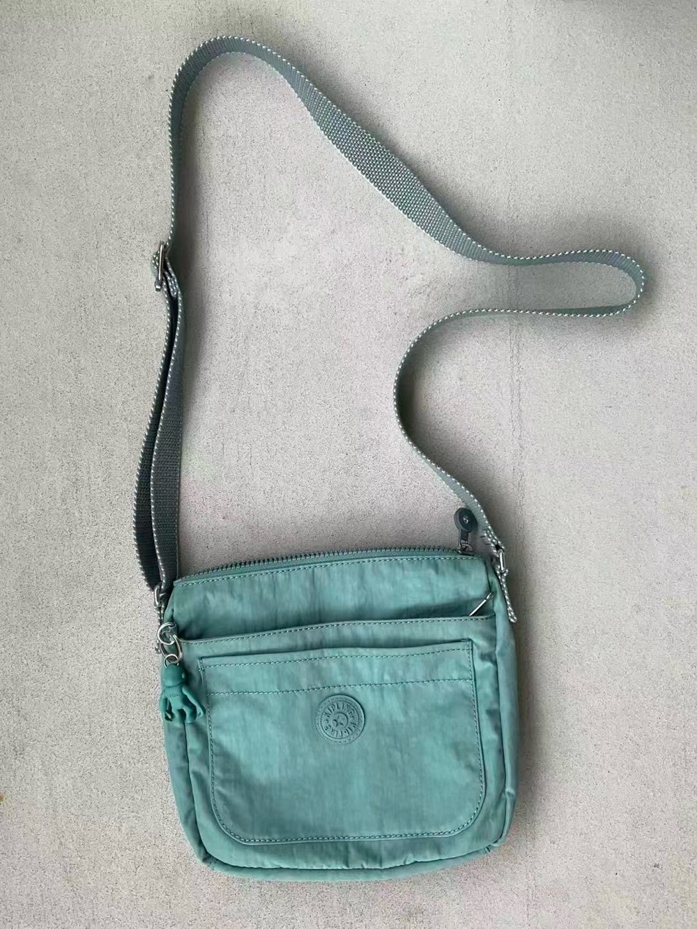 Like new Kipling Light Teal Crossbody Bag